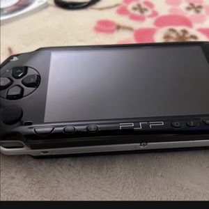 SonyPSP with Three games and all plugs